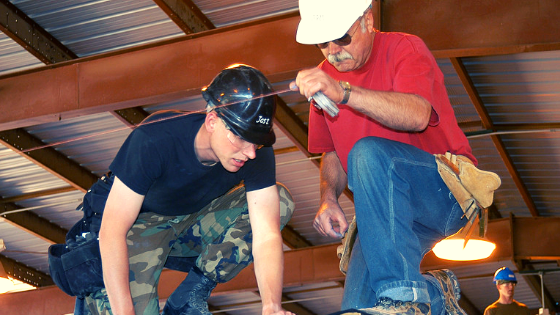 Two builders working on a project